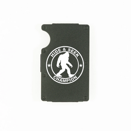 Black aluminum RFID wallet with engraved Hide and Seek Champion Bigfoot badge