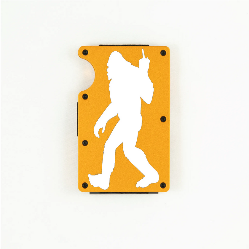 Orange aluminum RFID wallet with Bigfoot flipping the bird engraving