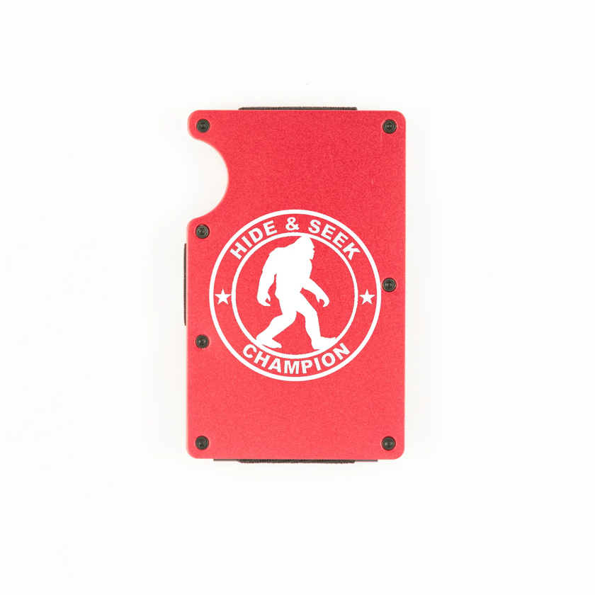 Red aluminum RFID wallet with engraved Hide and Seek Champion Bigfoot badge