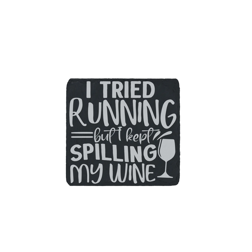 Slate coaster engraved with “I Tried Running But Kept Spilling My Wine” – humorous wine quote gift for runners and wine lovers.