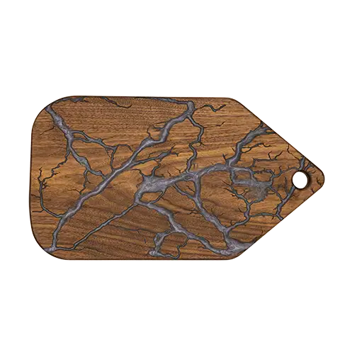 Rectangular walnut charcuterie board with silver and black epoxy fractal inlay.